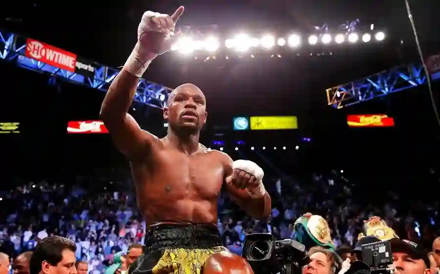 floyd-mayweather-raising-finger-light-shining