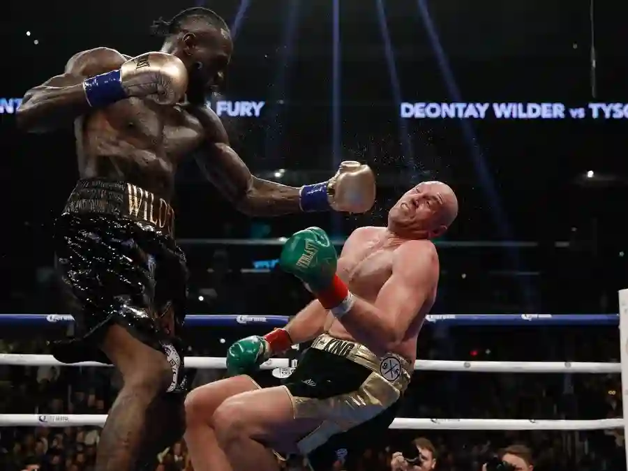 deontay-wilder-lands-punchon-tyson-fury-5b42241a3maex2s1 (1) deontay-wilder-lands-punchon-tyson-fury
