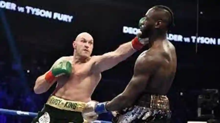 caption-tyson-fury-celebrating-his-victory-in-the-ring-pa9sovvrsdi8ds9s (1) Tyson Fury vs Wilder