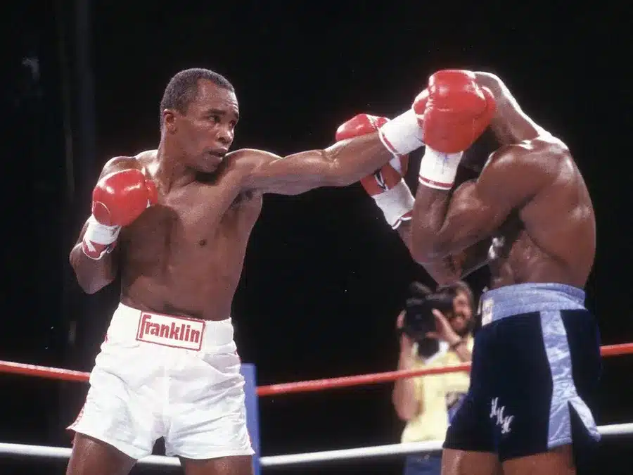 ray-leonard-breaking-through-opponent-s-guard-